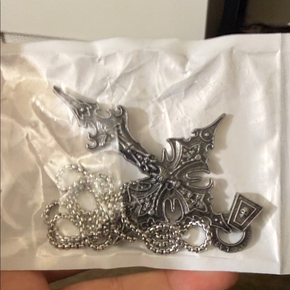 Richer Poorer Silver Ornate Brooch